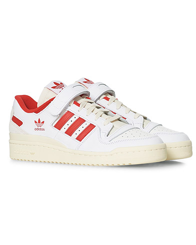 adidas white and red sneakers