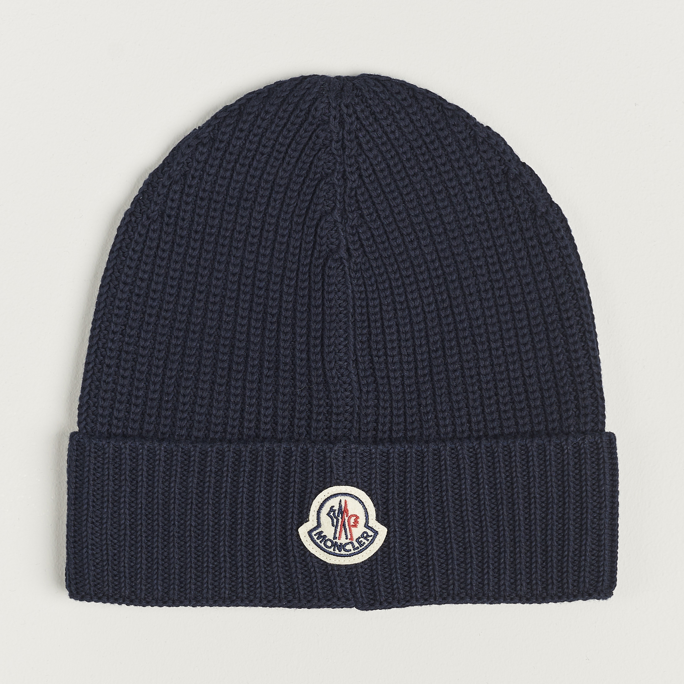 Moncler Logo Embossed Beanie Navy at CareOfCarl.com