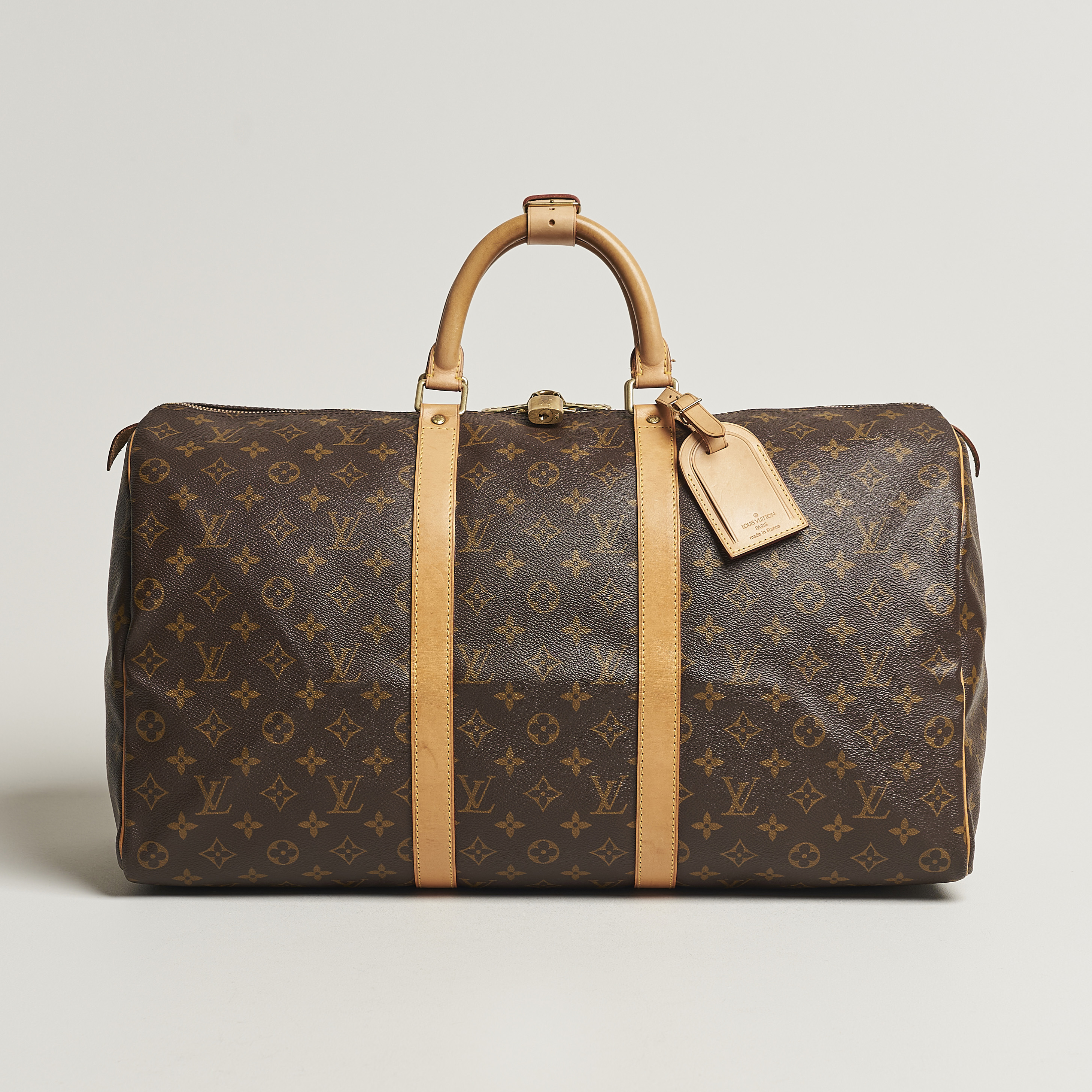 The hand bag silver Louis Vuitton worn by Drake on his account