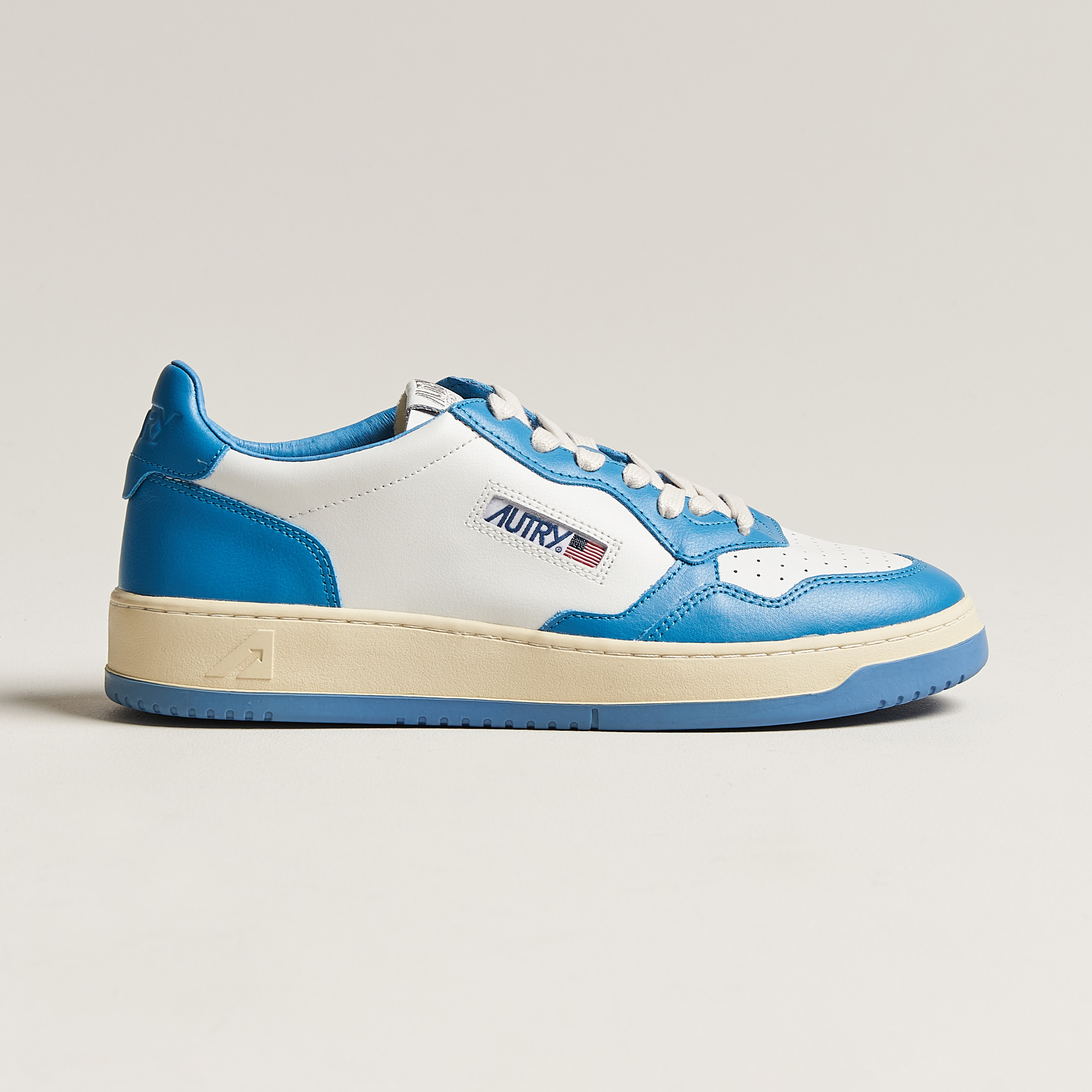 Autry Medalist Low Bicolor Leather Sneaker White/Blue at CareOfCarl.com