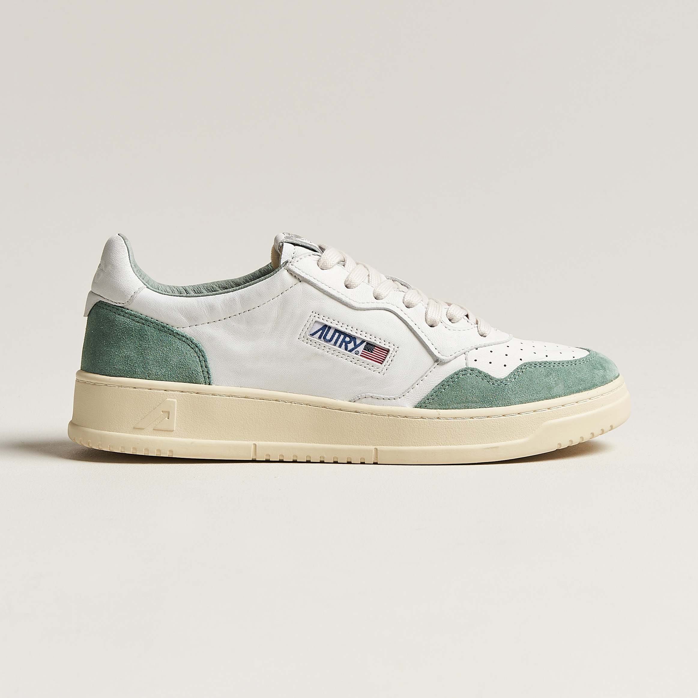 Autry Medalist Low Goat/Suede Sneaker White/Military at CareOfCarl.com