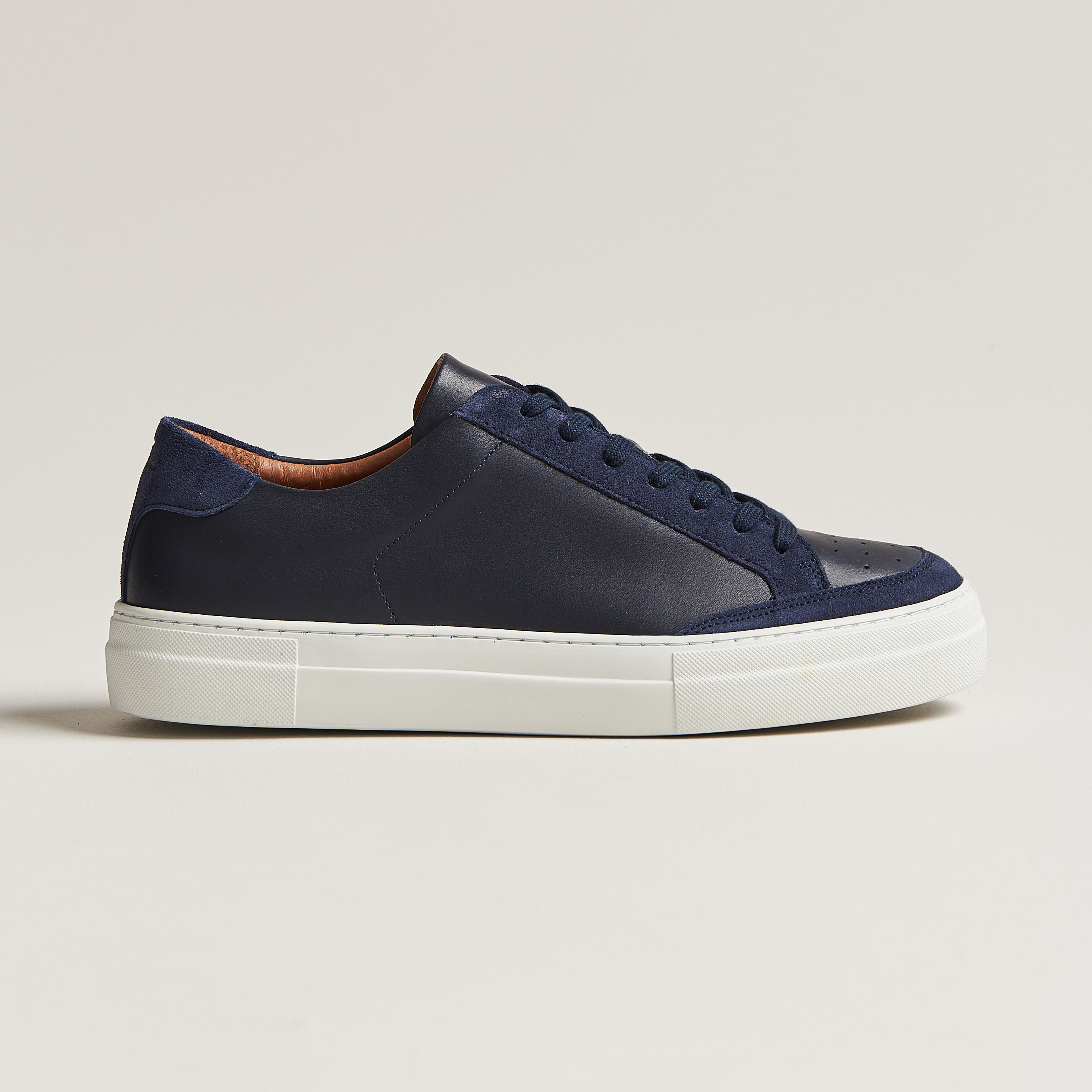 J.Lindeberg Art Signature Leather Sneaker Navy at CareOfCarl.com