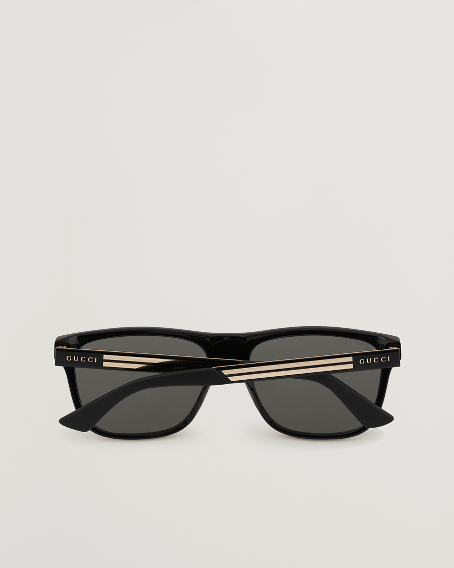 Gucci GG0687S Sunglasses Black at CareOfCarl.com