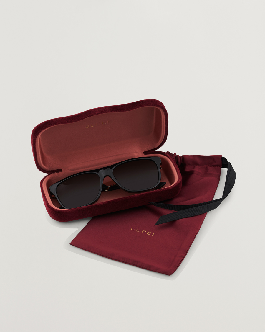 Gucci GG0687S Sunglasses Black at CareOfCarl.com