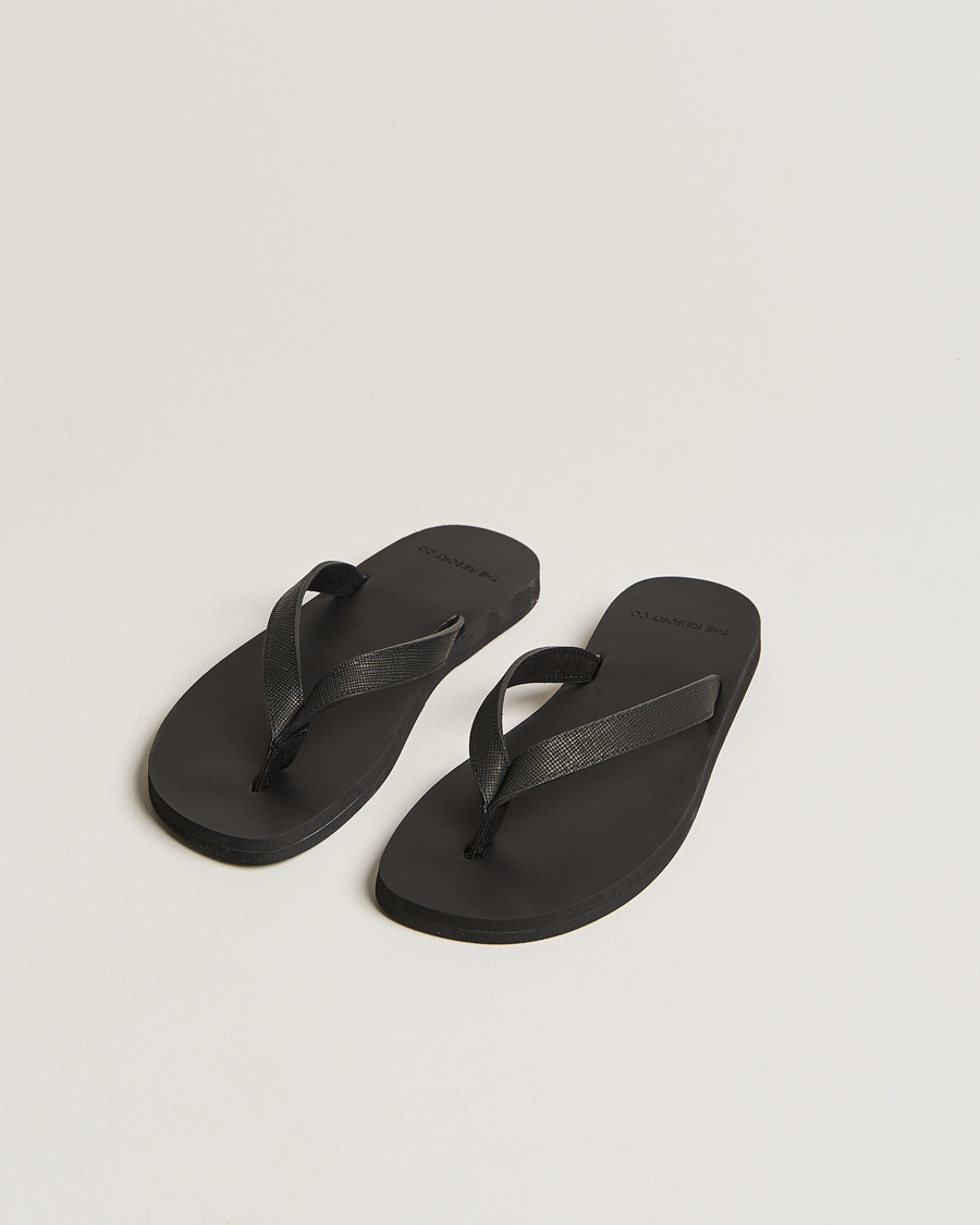 Black leather deals flip flops womens