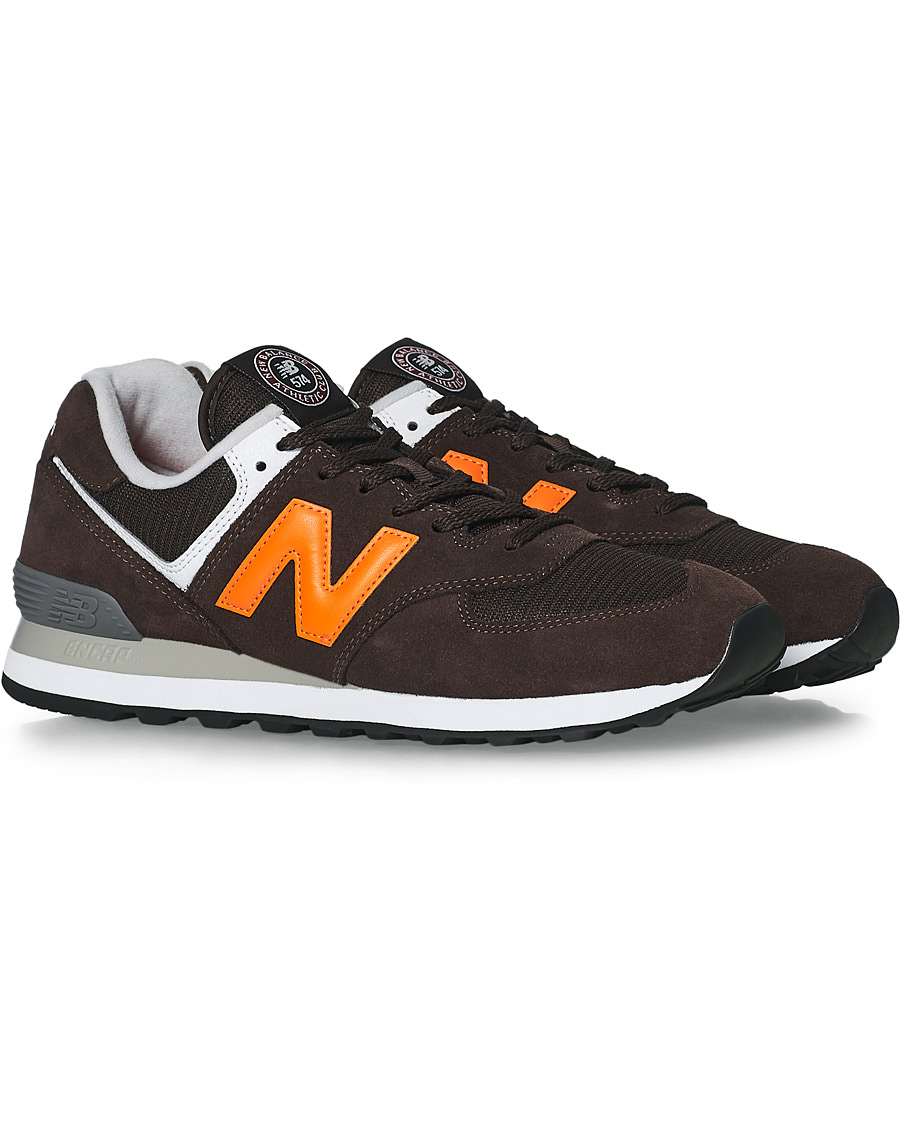 Black and orange outlet new balance 574