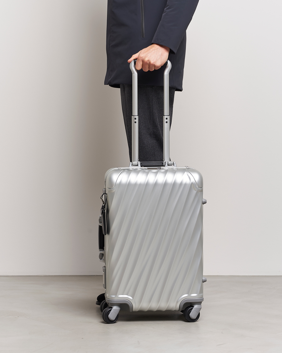 Tumi cheap silver luggage