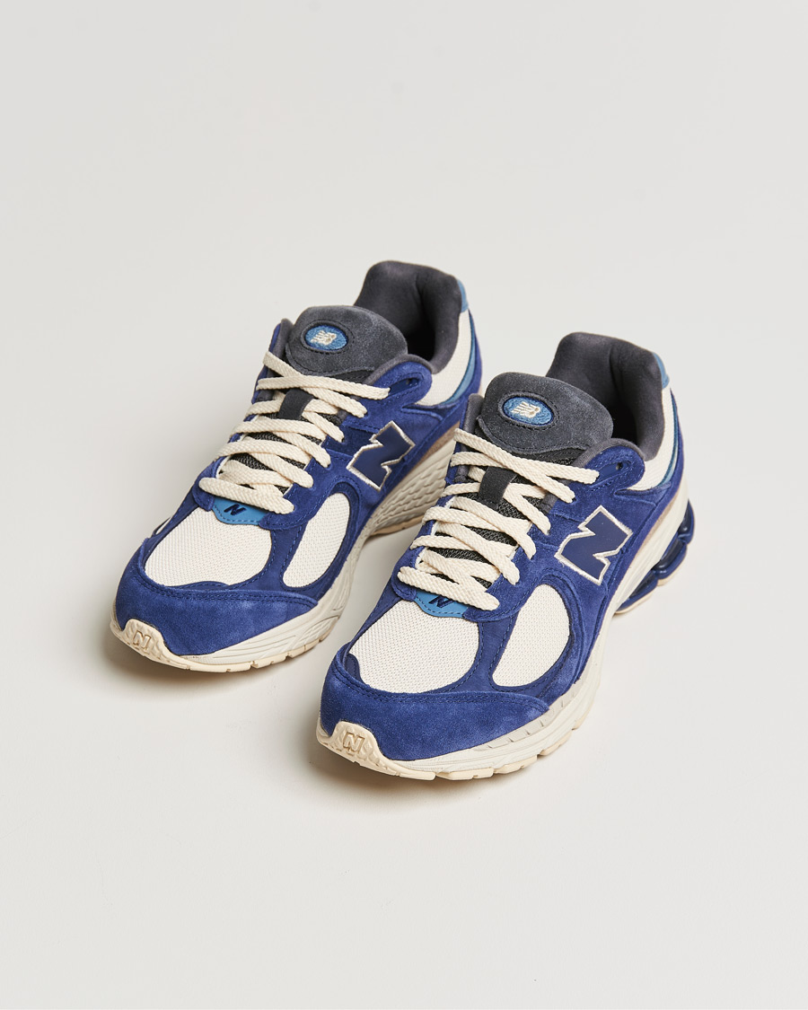 New Balance M2002 Sneaker Blue at CareOfCarl.com