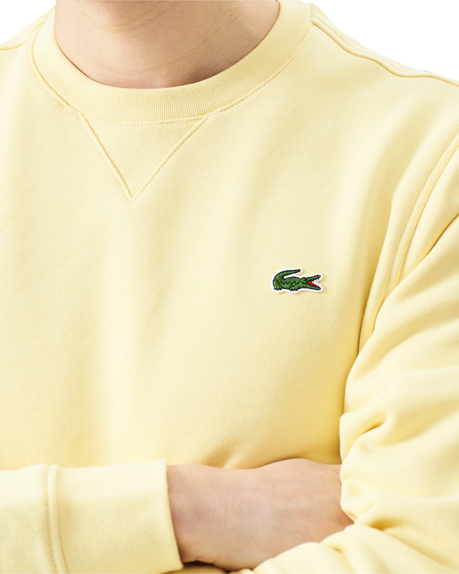 Lacoste Crew Neck Sweatshirt Napolitan Yellow at CareOfCarl