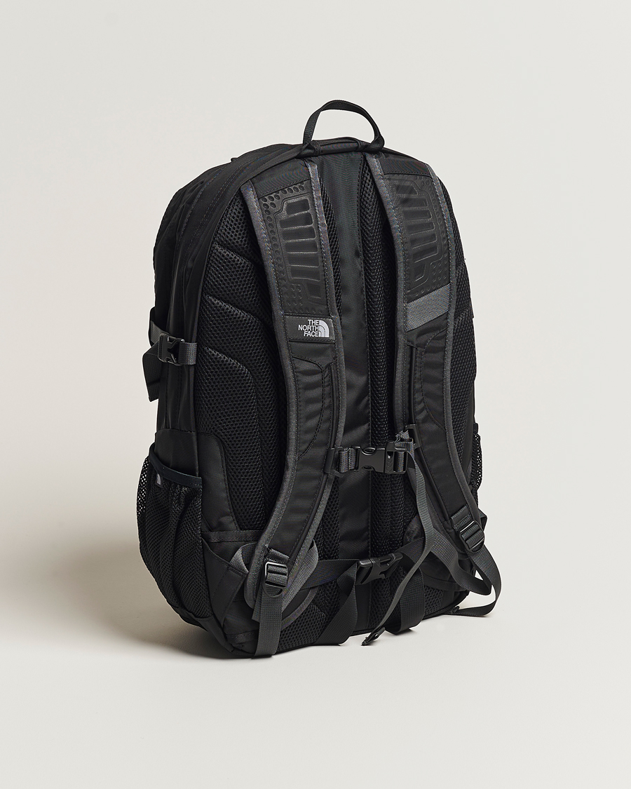 The north face white store and black borealis classic backpack