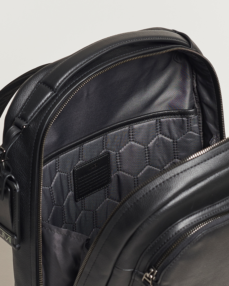 Tumi black best sale leather backpack