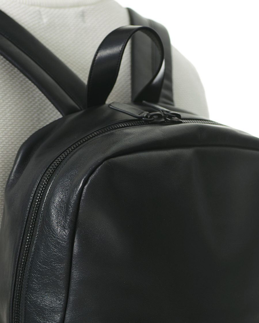 Common projects hotsell leather backpack