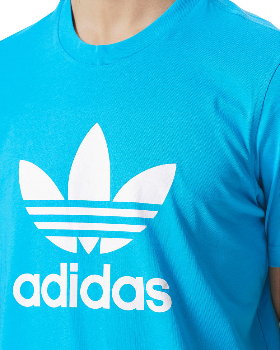 blue adidas trefoil shirt