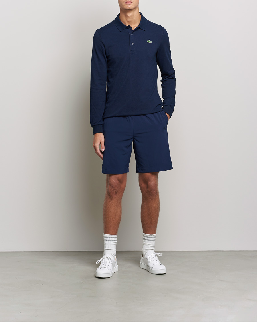 marmorering øge Begge Lacoste Sport Performance Long Sleeve Polo Navy Blue at CareOfCarl.com