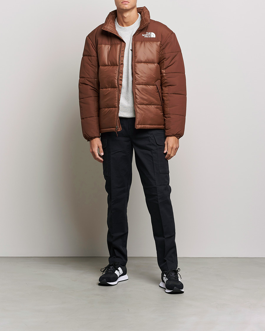 light brown north face jacket