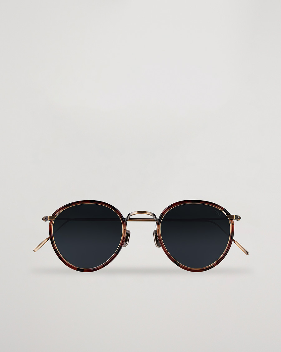 Eyevan 7285 717E Sunglasses Antique Gold at CareOfCarl.com