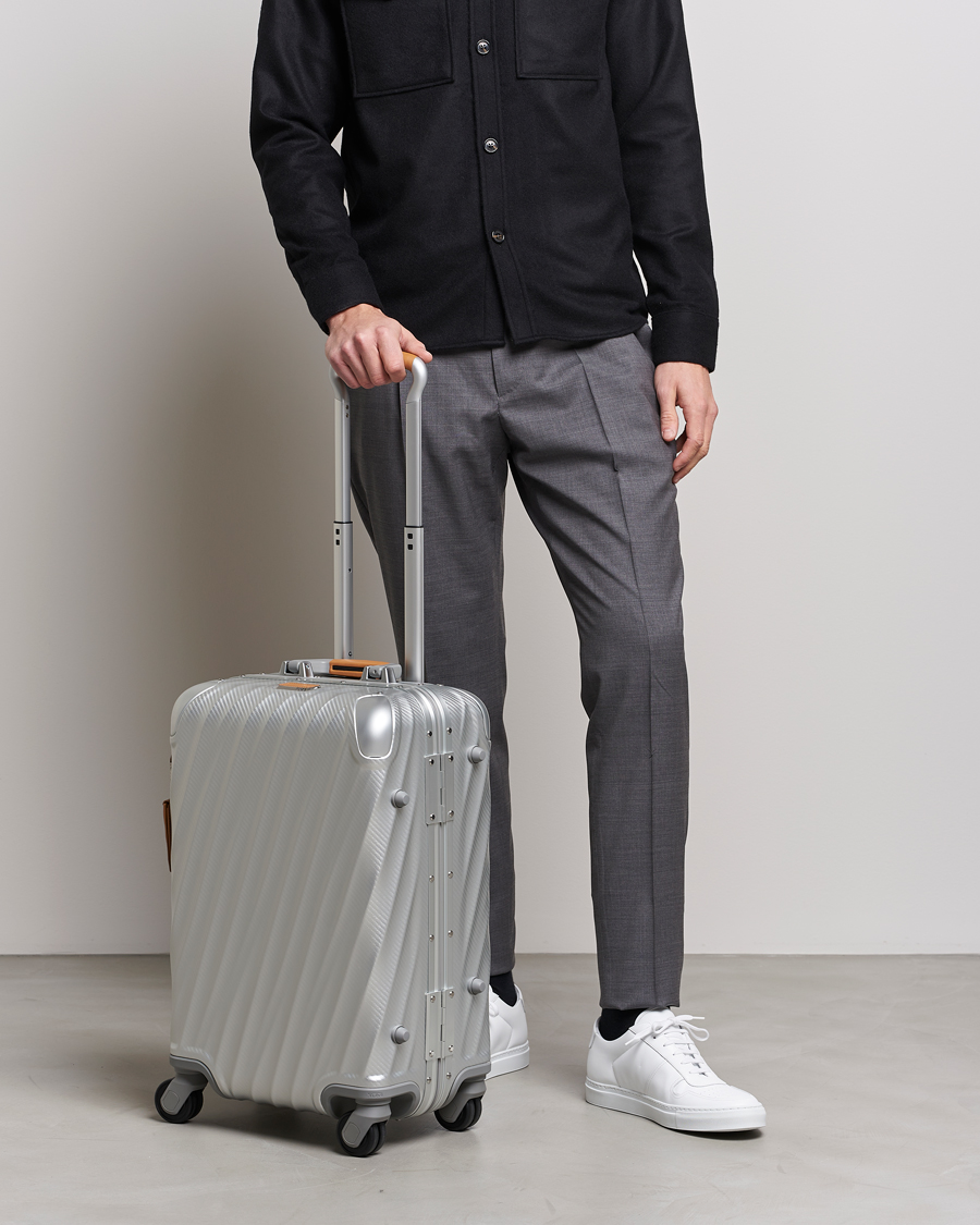 Tumi aluminum carry on sale on