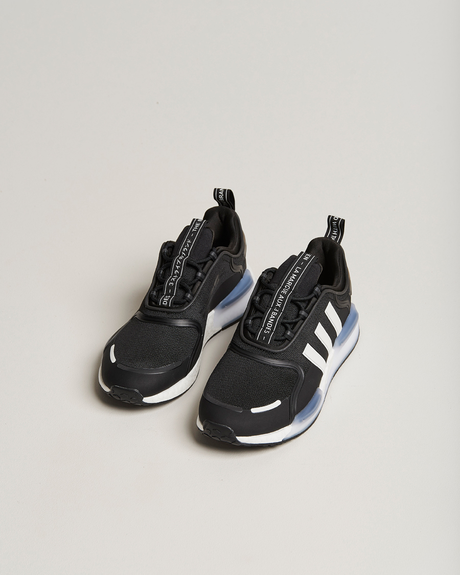 Adidas black and white shoes clearance nmd