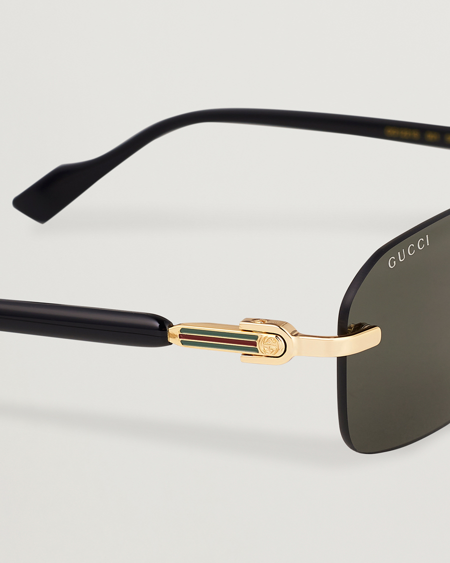 Black and cheap gold gucci sunglasses