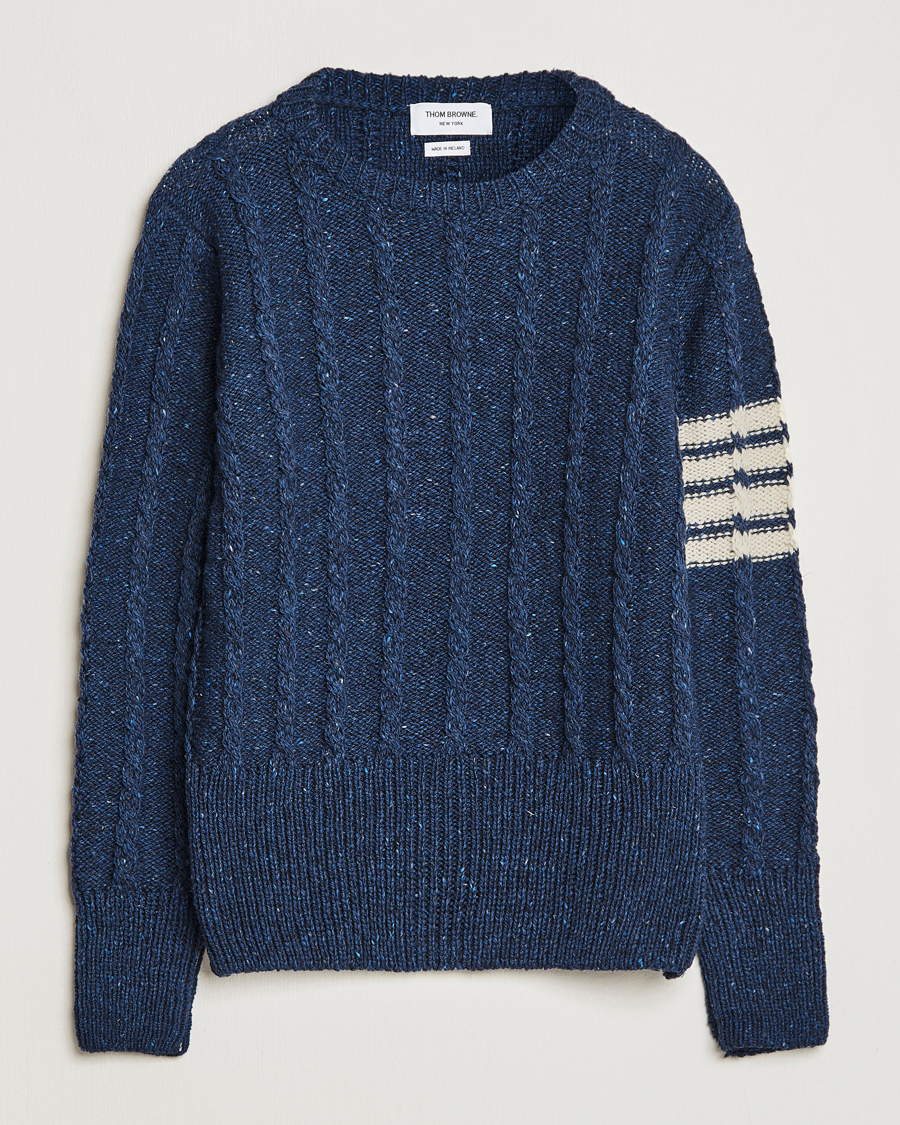 Thom Browne shops sweaters