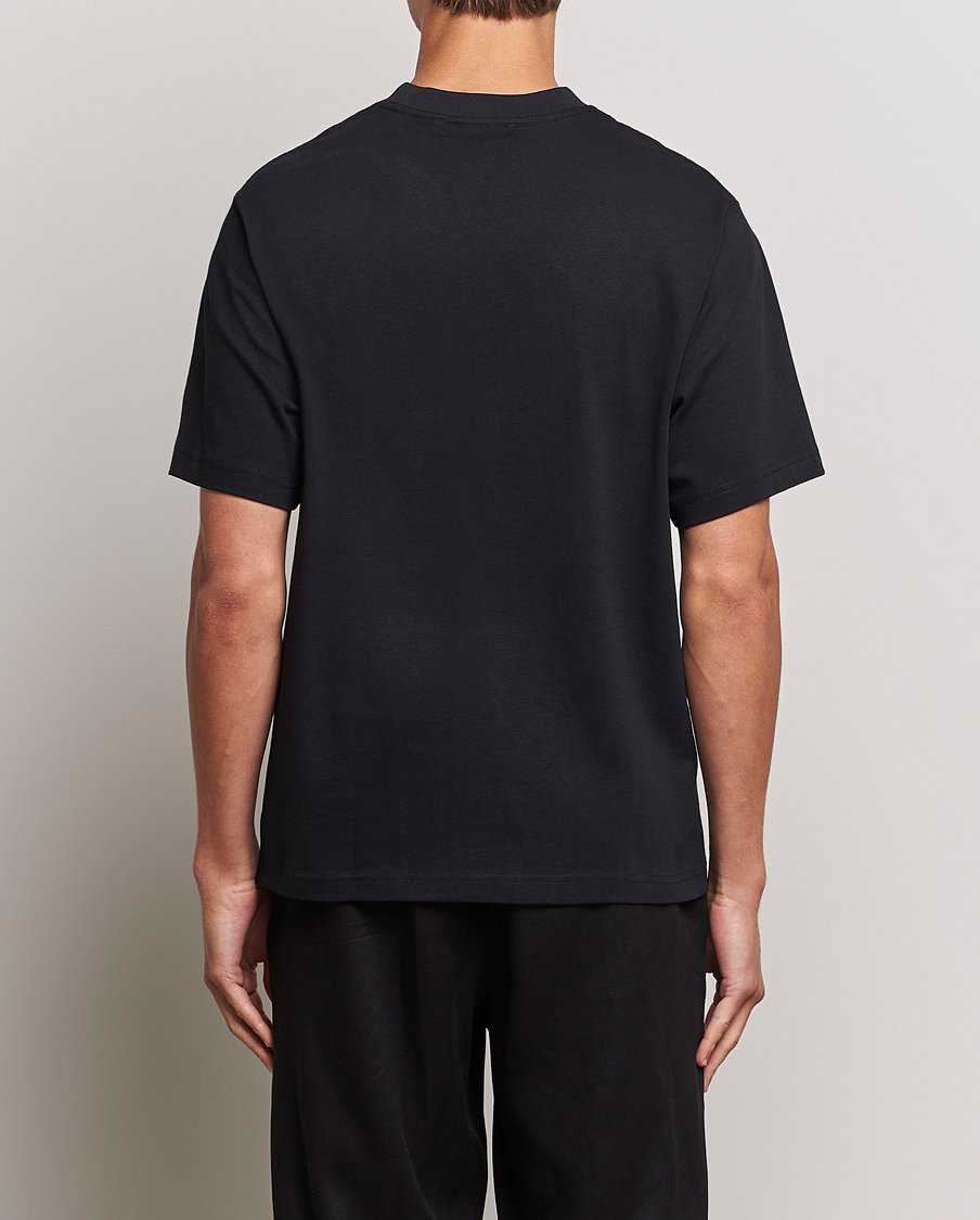 Axel Arigato Signature Crew Neck T Shirt Black at CareOfCarl