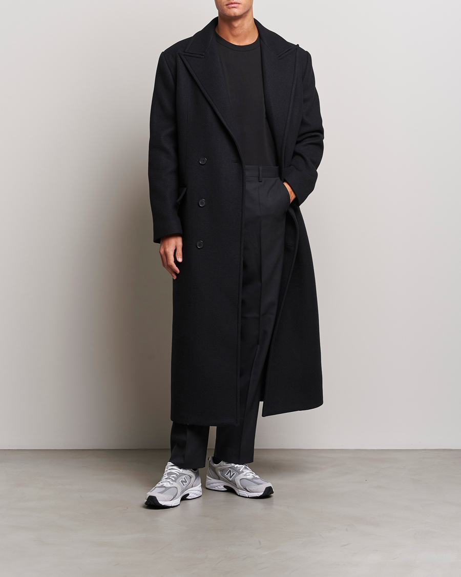 Long black single breasted on sale coat