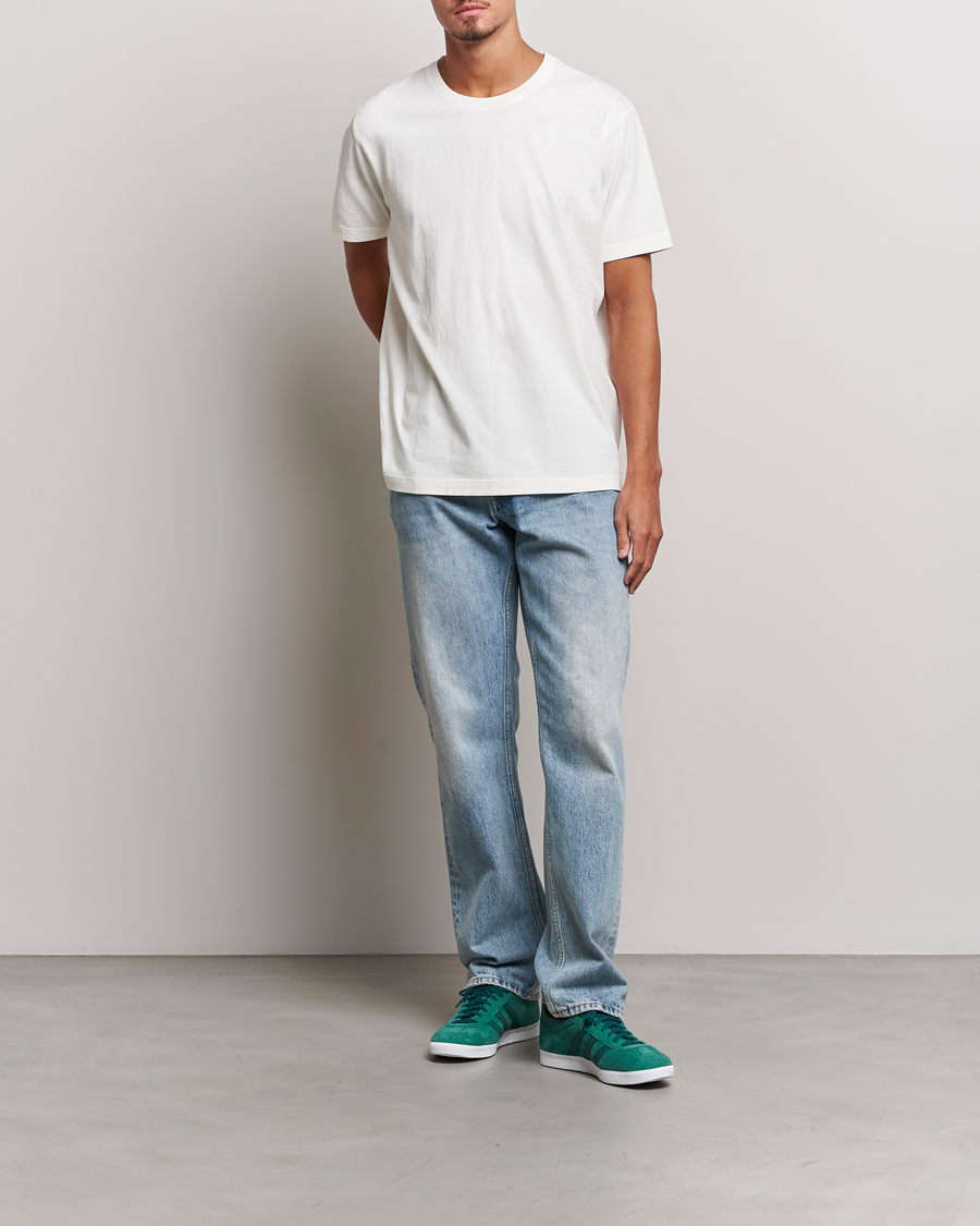 White store nudie jeans