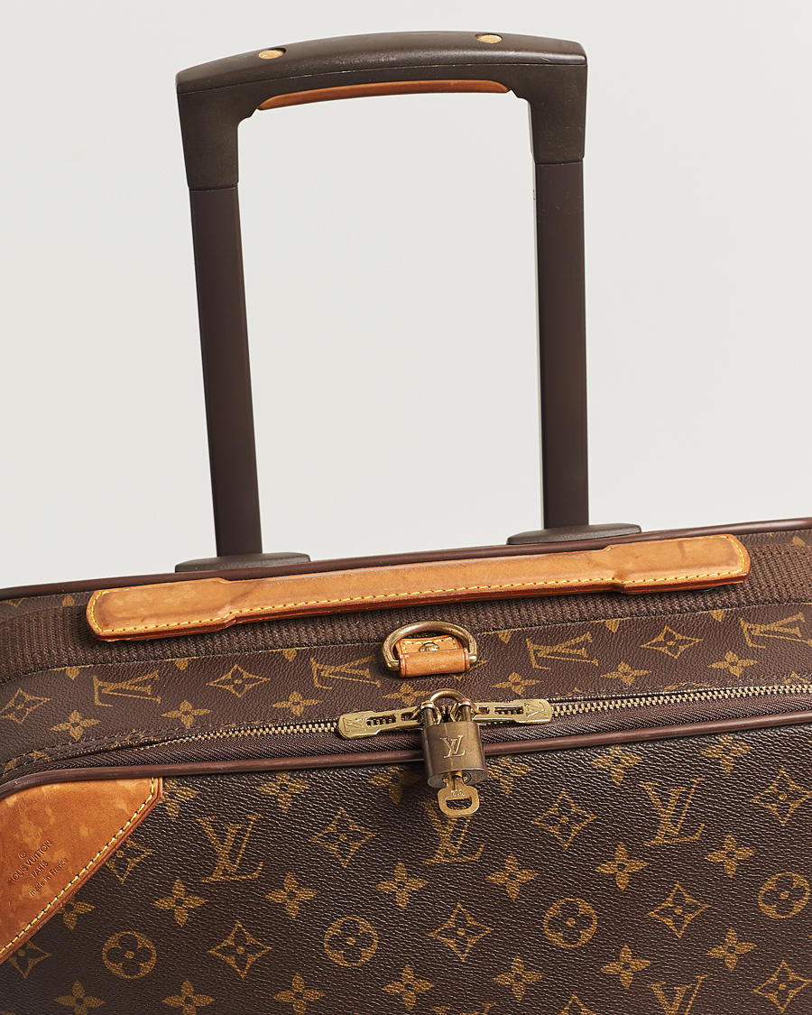 Pre owned outlet louis vuitton luggage