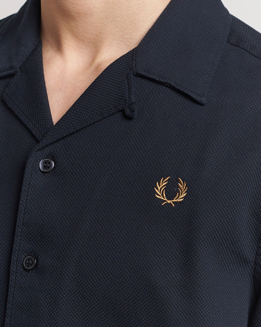 Fred Perry Pique Textured Short Sleeve Shirt Navy at CareOfCarl.com