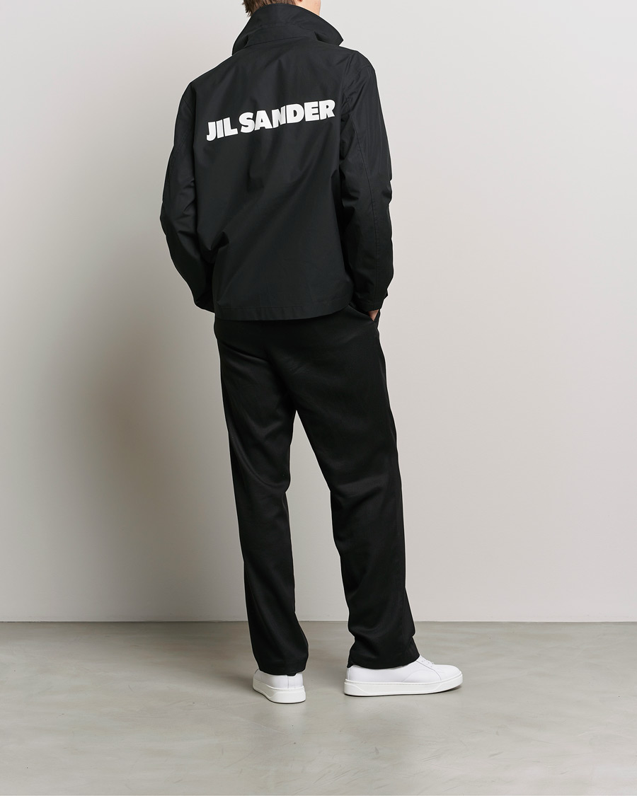 Jil Sander Back Printed Coach Jacket Black at CareOfCarl.com