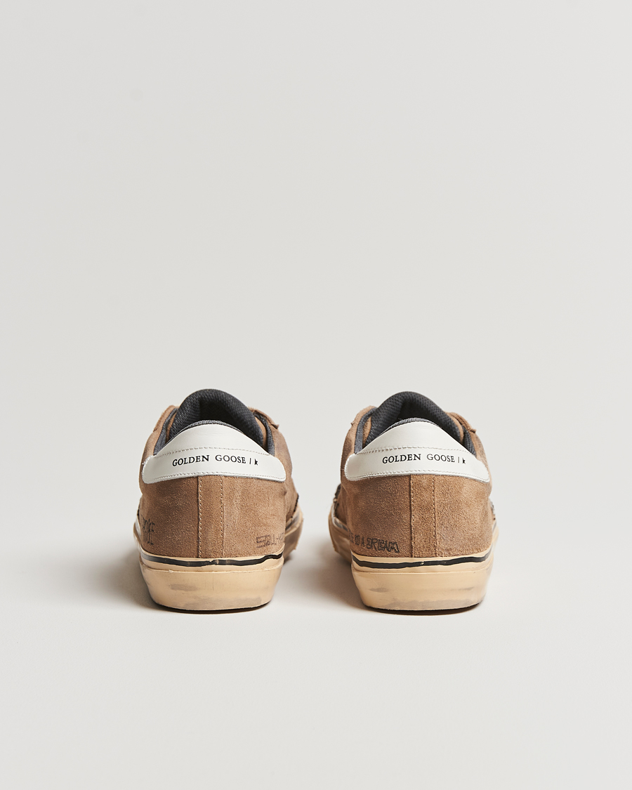 Golden goose deluxe brand superstar sale distressed leather and suede sneakers