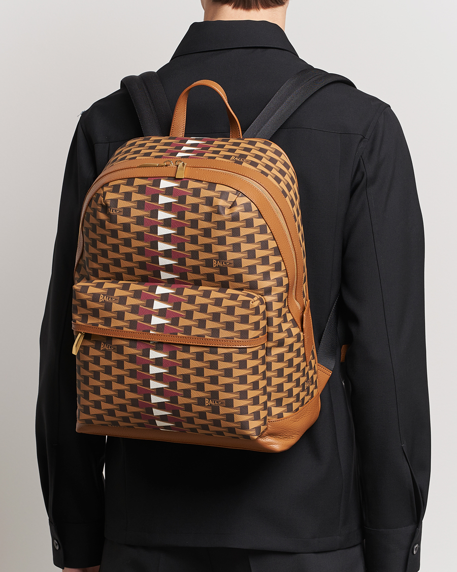 Monogram best sale leather backpack