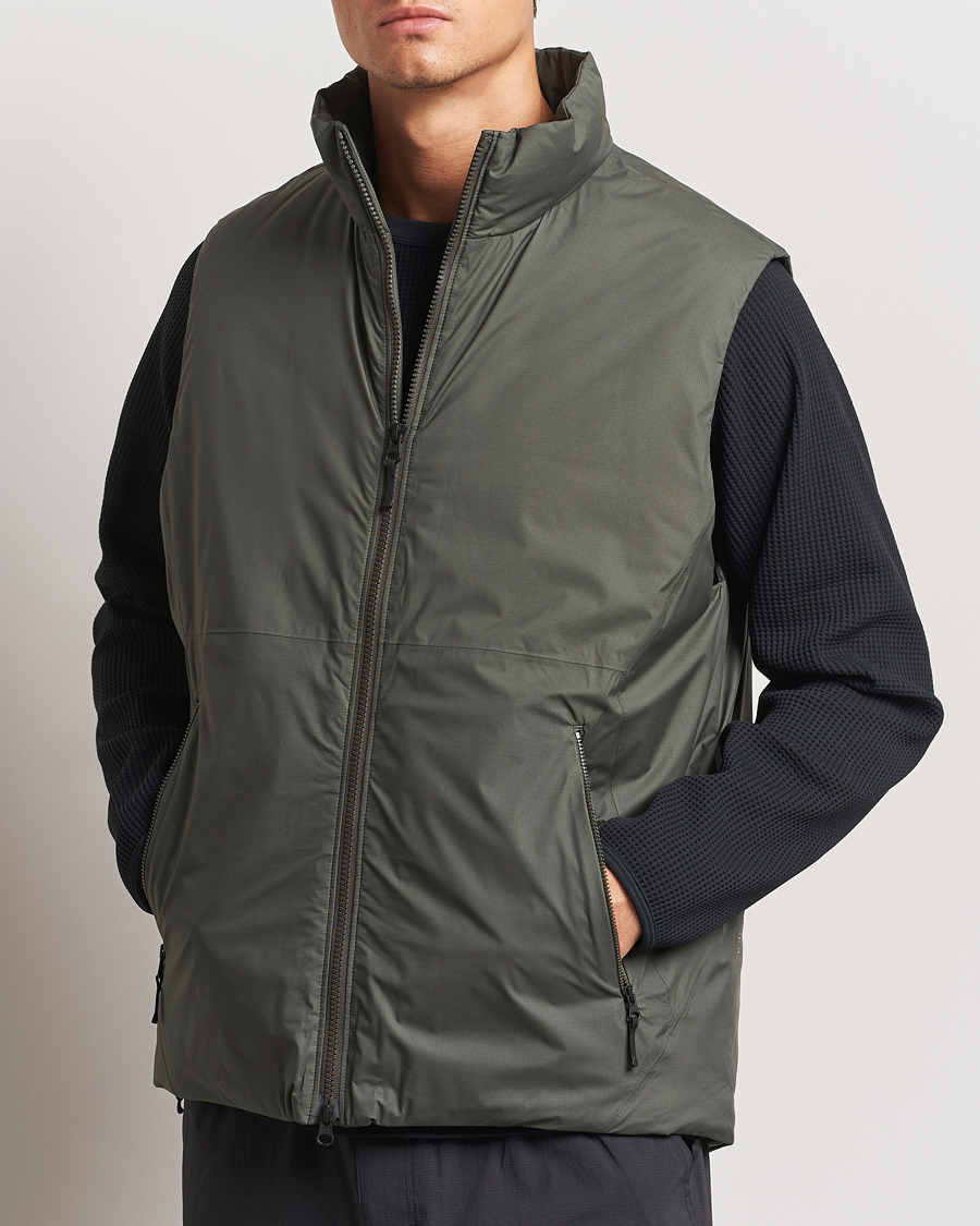 Men | Clothing | Goldwin | GORE-TEX Windstopper Puffy Vest Dark Olive